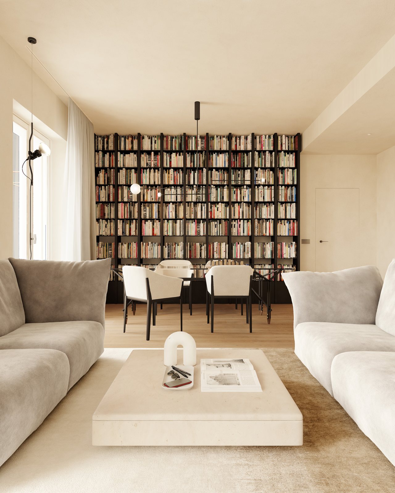 Soggiorno con libreria a tutta parete